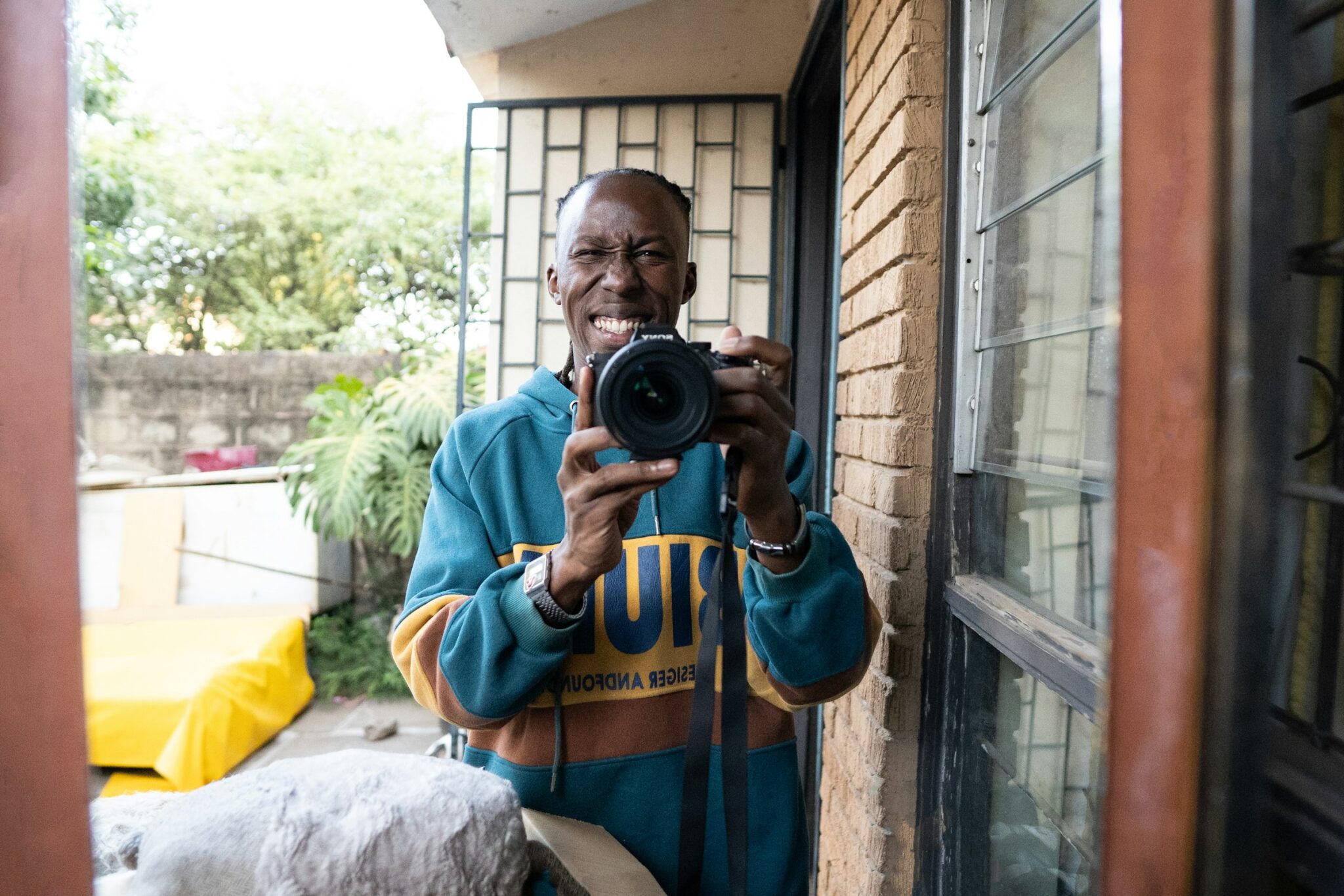 A Nairobi photographer shooting with his camera