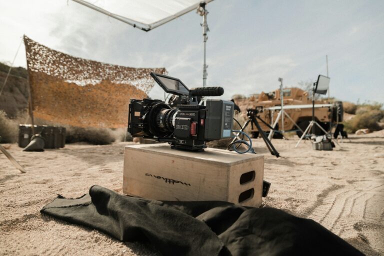 A cinema camera rigged on location in the field